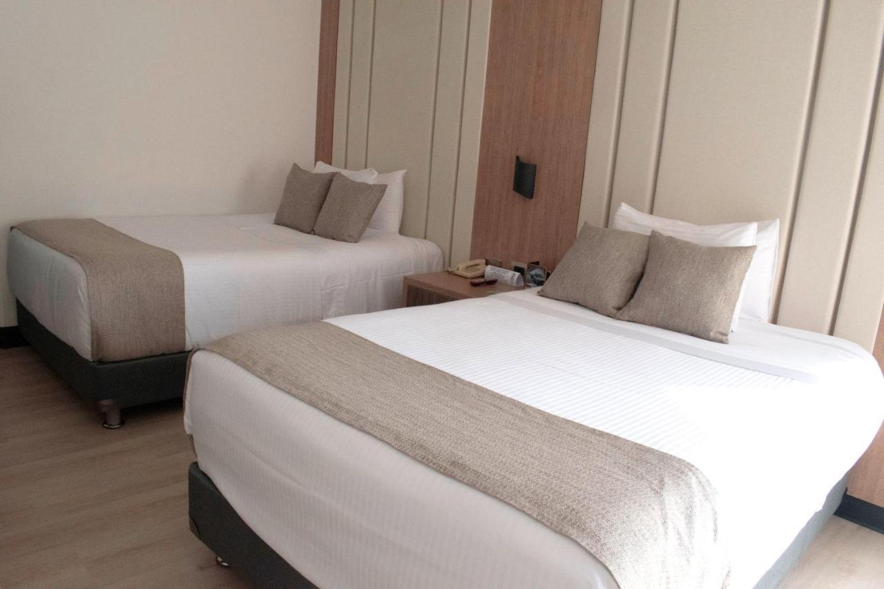 Hotel Dann Carlton Belfort ميديلين المظهر الخارجي الصورة A room at the hotel